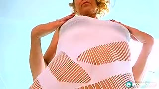 A red-hot 54-year-old's tiny bikini and gaping pussy show