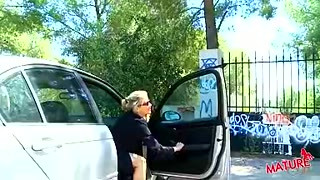 Mature blonde sucks dick in an abandoned building