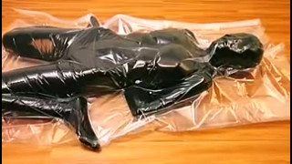 Girls experience syncope in vacuum bag (horizontal version)