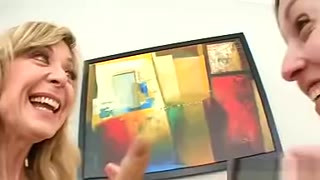 Blonde MILF with glasses is happy to eat brunette's muff