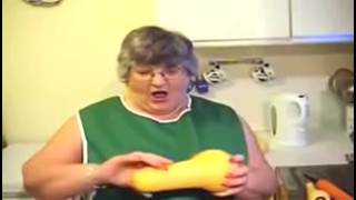 Old fat whore caresses pussy with vegetables and cums
