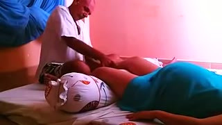 Pregnant woman getting leg massage